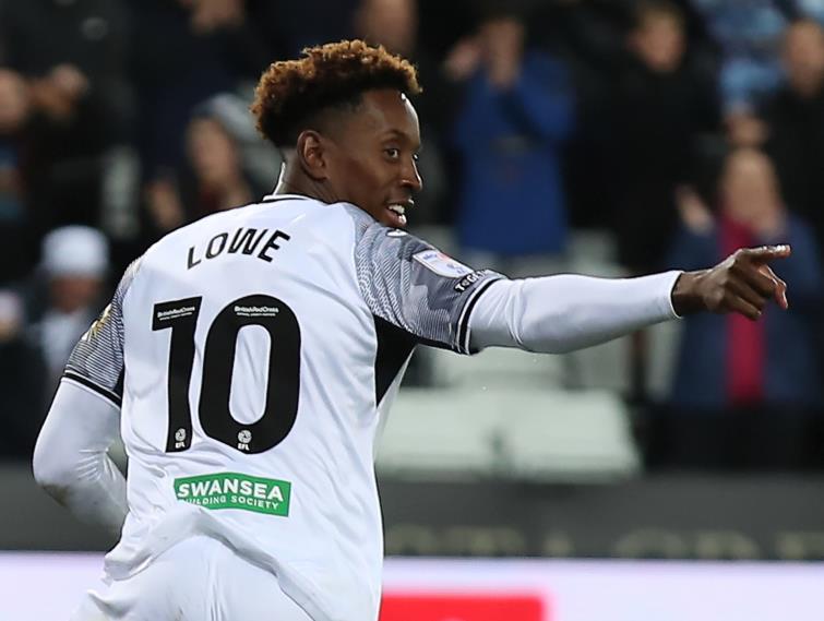 Jamal Lowe celebrates scoring the opener for Swansea City